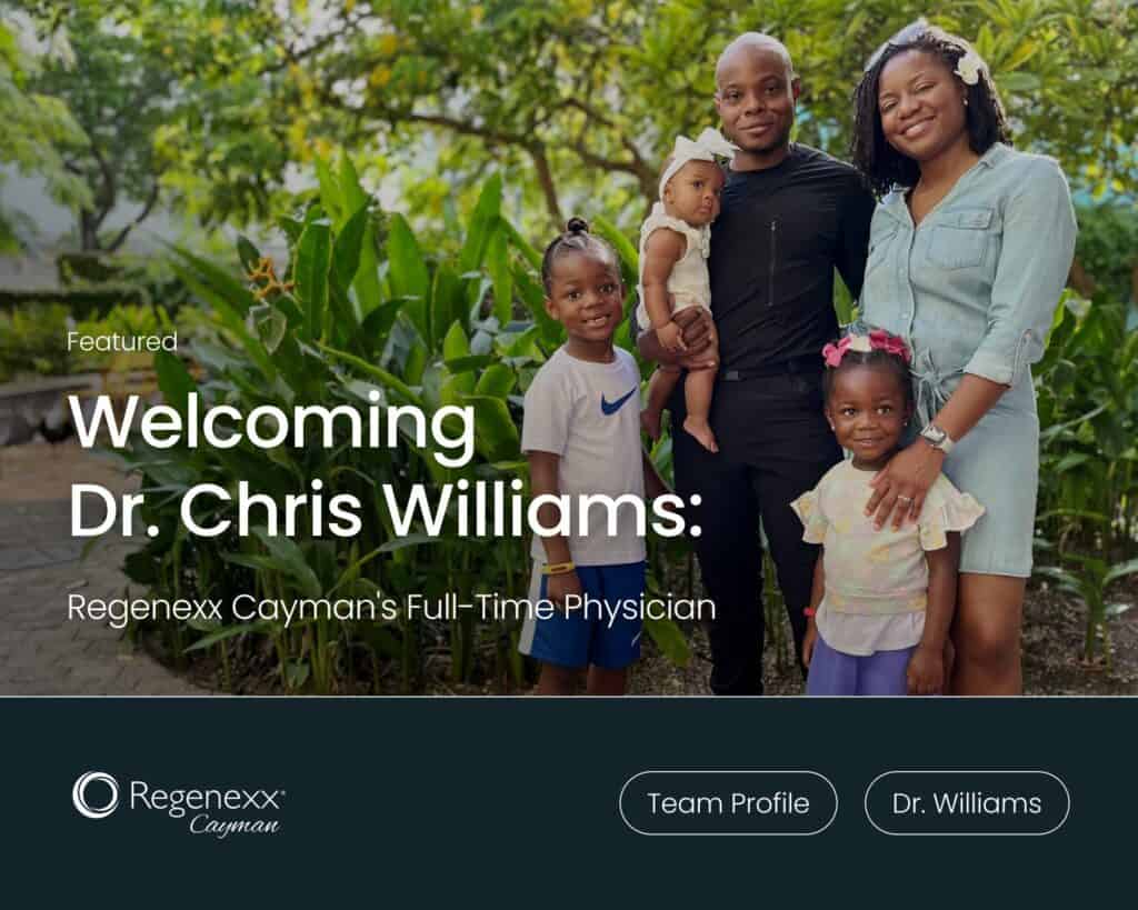 Dr. Christopher J. Williams and his family smiling at Camana Bay in the Cayman Islands